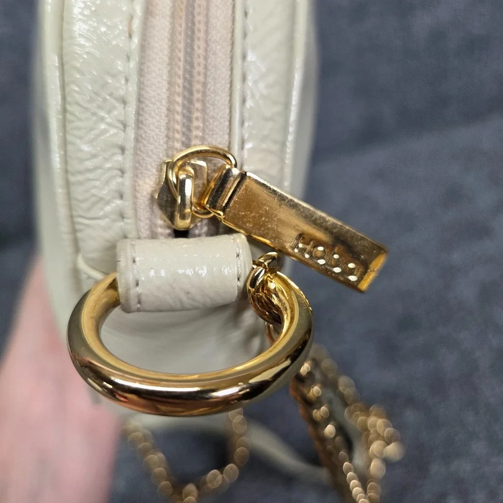 HOBO Deb Round Patent‎ Leather Crossbody bag Creme & Gold chain strap RARE
